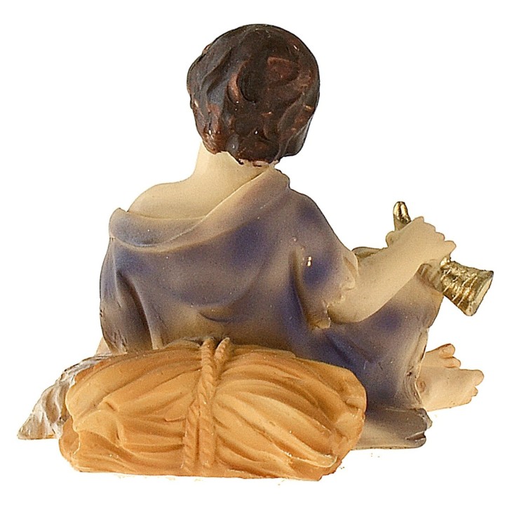 Niño sentado con cordero serie 12 cm en resina