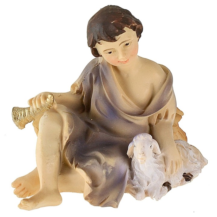 Niño sentado con cordero serie 12 cm en resina