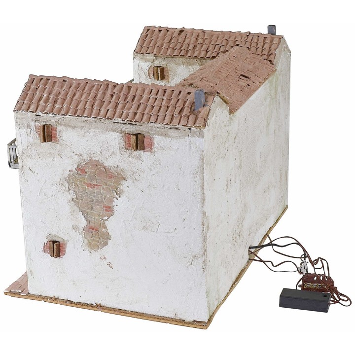 Stuccoed farmhouse with working illuminated fire complete with