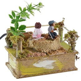Giostra con bambini cm 14x8,5 serie 10 cm in movimento