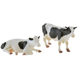 Coloca 2 vacas moteadas en PVC