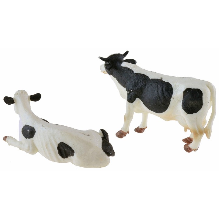 Coloca 2 vacas moteadas en PVC