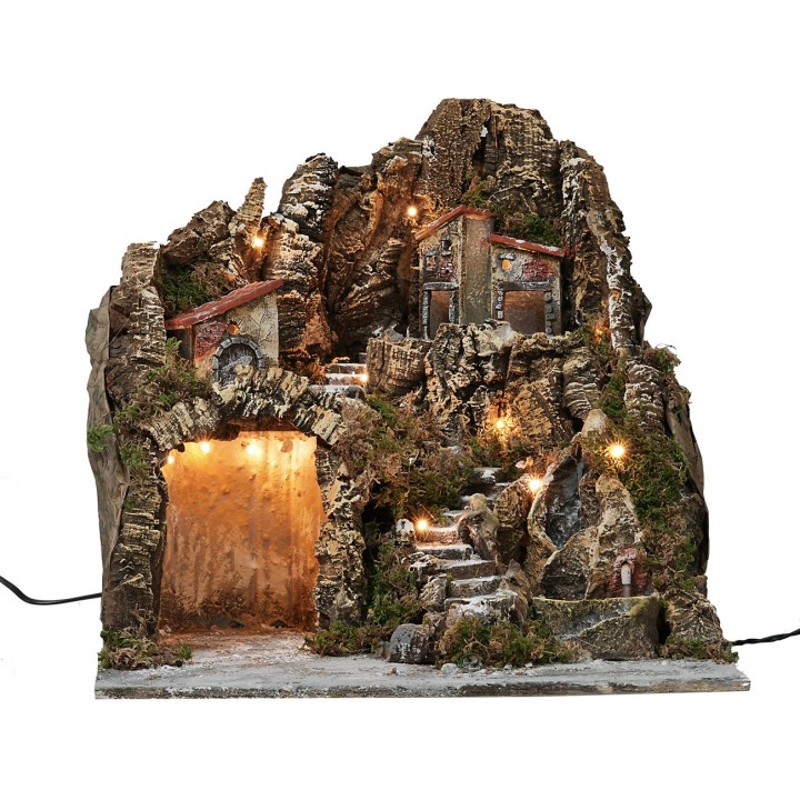 Illuminated nativity scene with waterfall and functioning