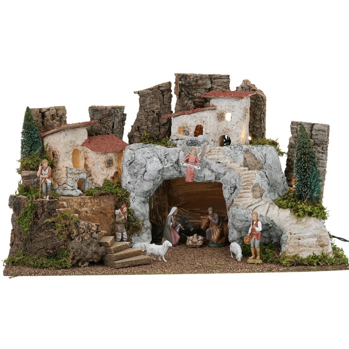 Nativity scene with a white stone cave complete with Landi