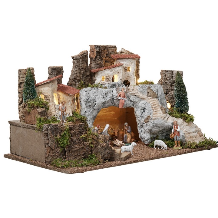Presepe con grotta in pietra bianca completo di statue Landi