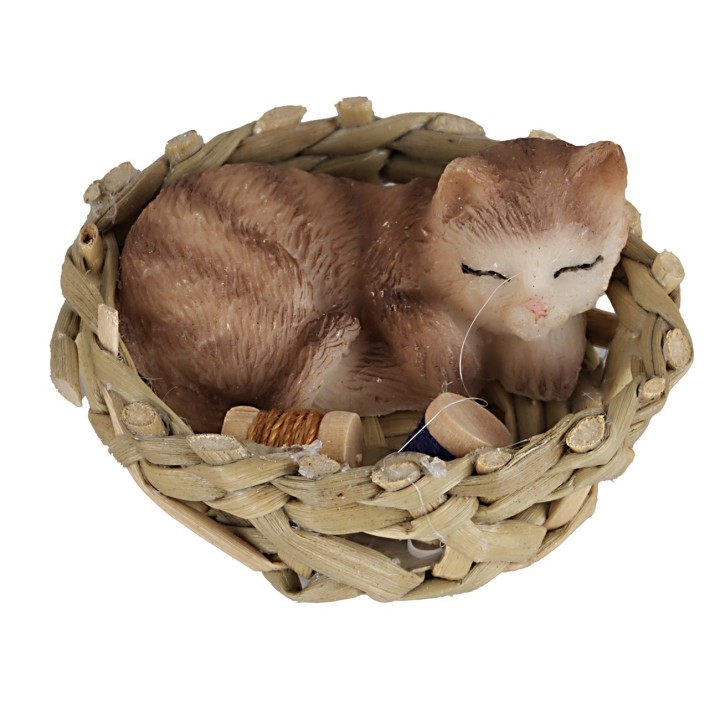 Cat in assorted patterns sleeping in a basket Ø 4 cm