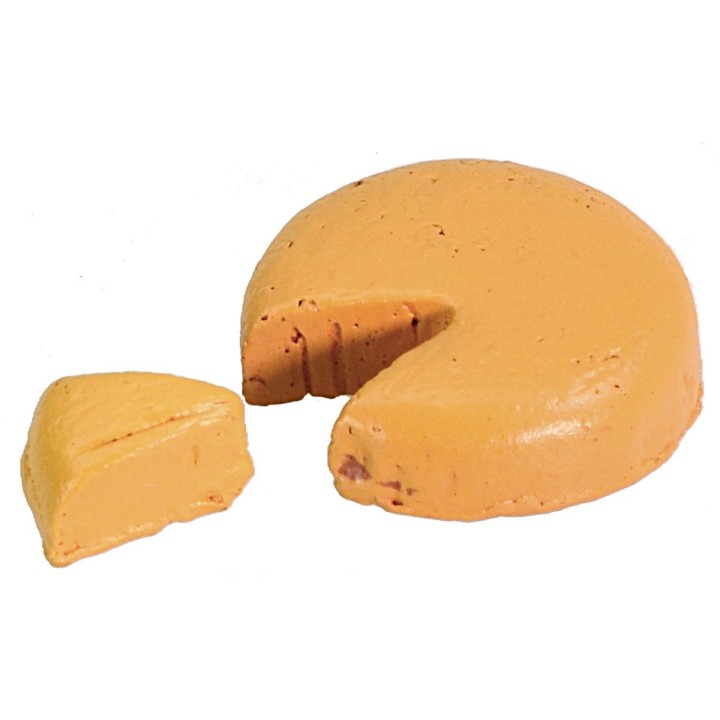 Cheese wheel with a 2 cm slice.