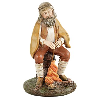 Pastor sentado frente al fuego serie 10 cm en resina Landi