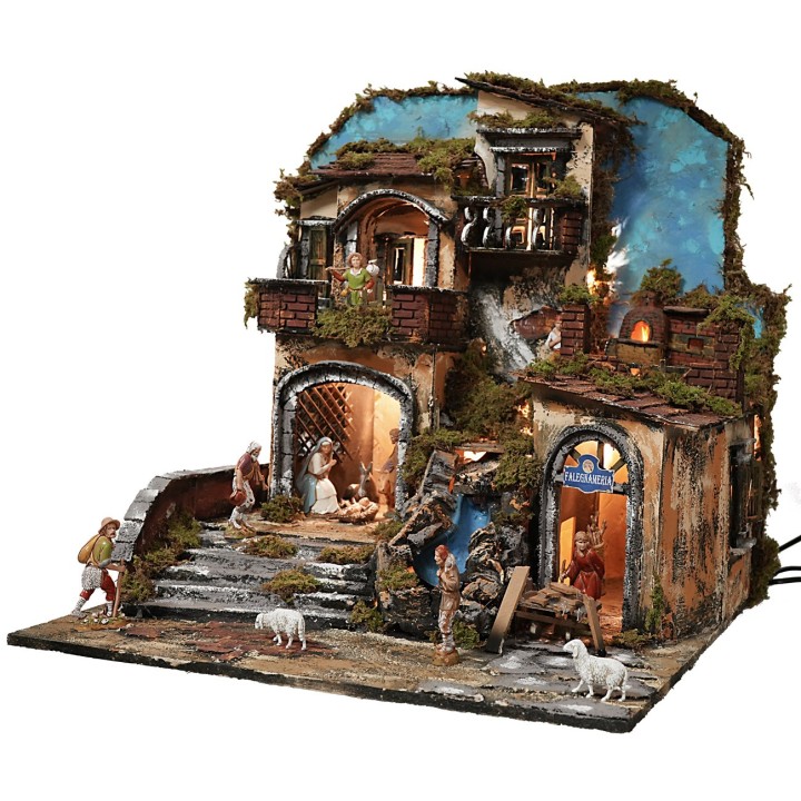 Illuminated nativity scene with working waterfall and flame