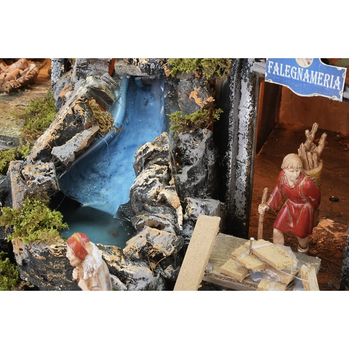 Belén iluminado con cascada funcional y fuego efecto llama
