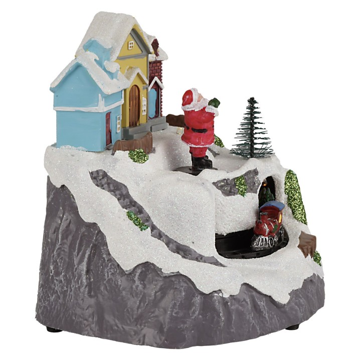Village with Santa Claus and train complete with lights and