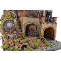 The crib with the village lit up with a fountain and oven 50x40