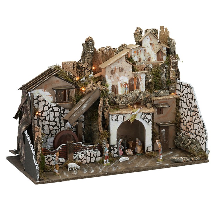 Nativity scene with statues illuminated with a mill complete