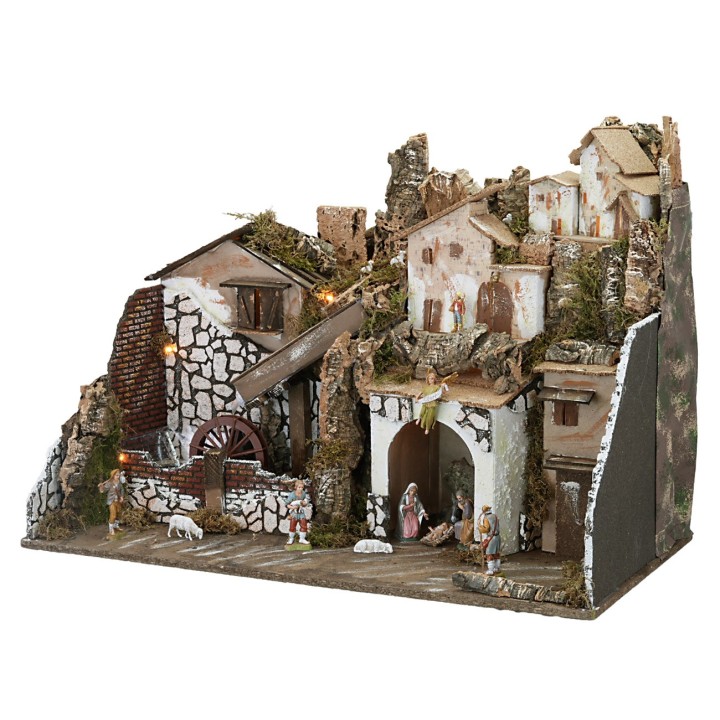 Nativity scene with statues illuminated with a mill complete