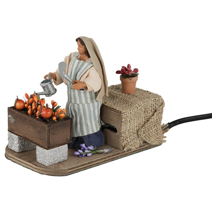 Donna che annaffia 12 cm in movimento