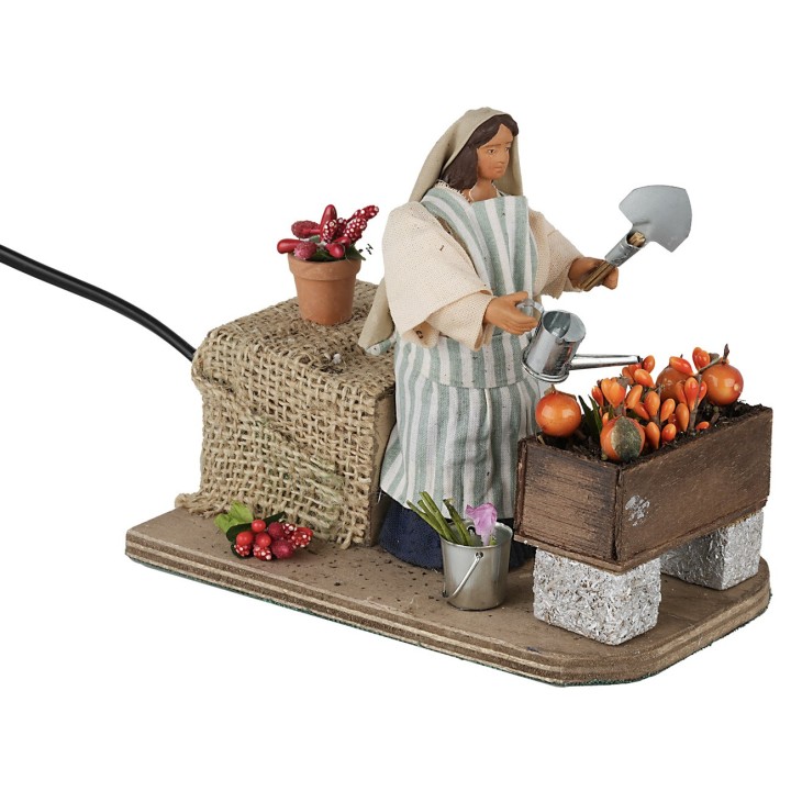 Woman watering 12 cm in motion