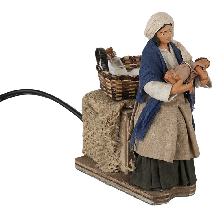 Woman with baby in arms 12 cm in motion