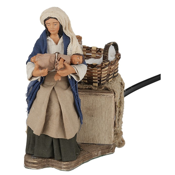 Woman with baby in arms 12 cm in motion