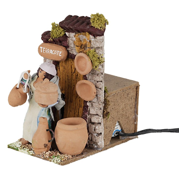 Donna che vende terracotta 10 cm in movimento