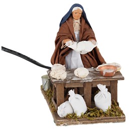 Woman kneading 12 cm in motion