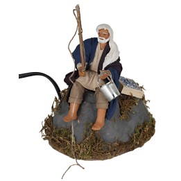 Seated fisherman 12 cm in motion