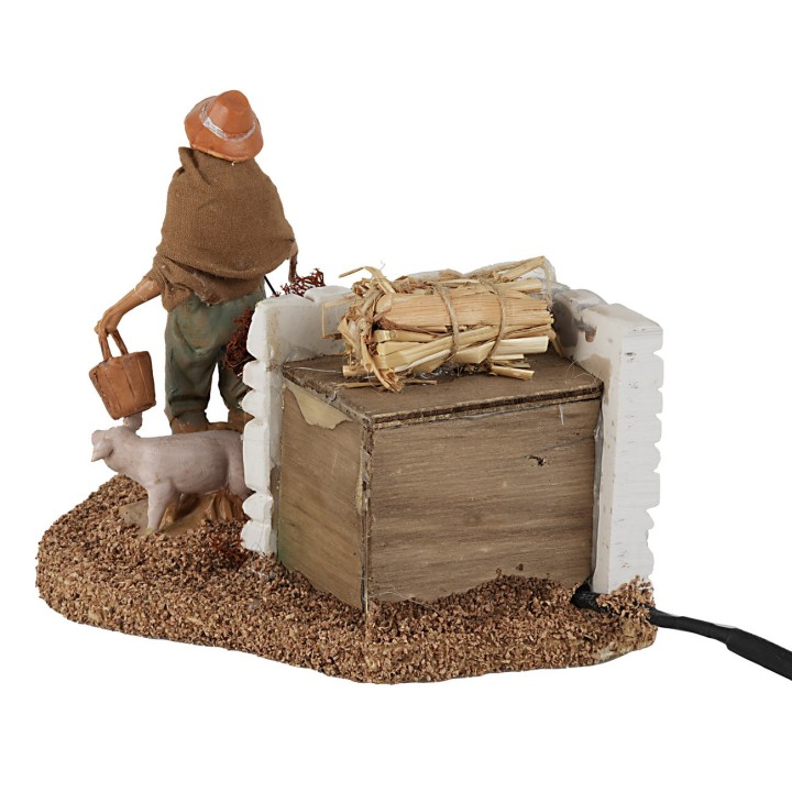 Shepherd with pigs 12 cm with dual movement