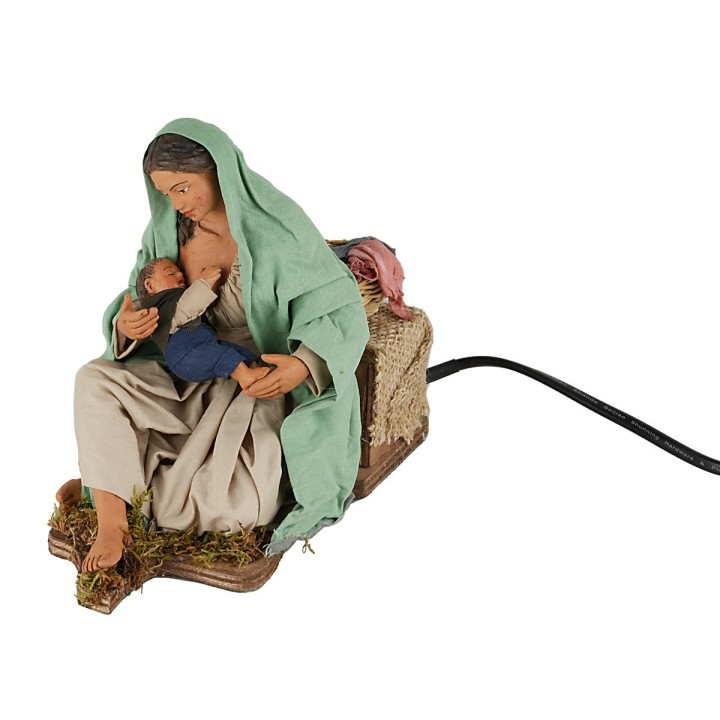 Breastfeeding woman seated in motion series 30 cm