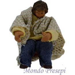 Niño sentado terracota vestido articulado