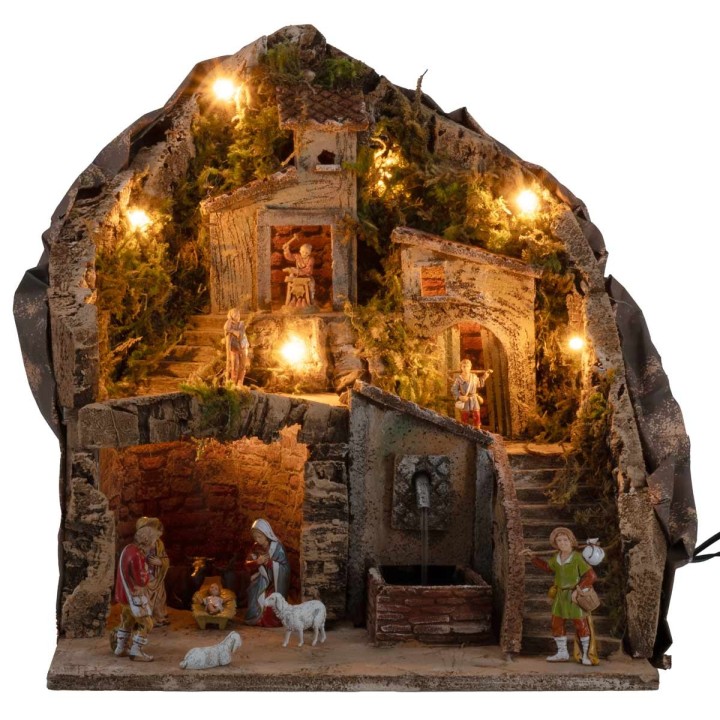 Pesebre iluminado con fuente 34x27x38h completo de estatuas