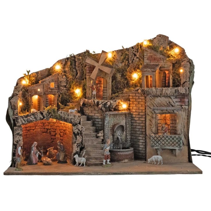 Pesebre iluminado con molino y fuente que funcionan con