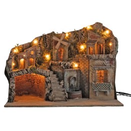 Pesebre iluminado con molino y fuente que funcionan con
