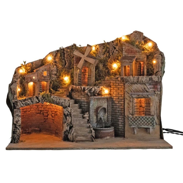 Pesebre iluminado con molino y fuente que funcionan con