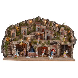 Pesebre iluminado con cuevas, casitas, arroyo y horno funcional