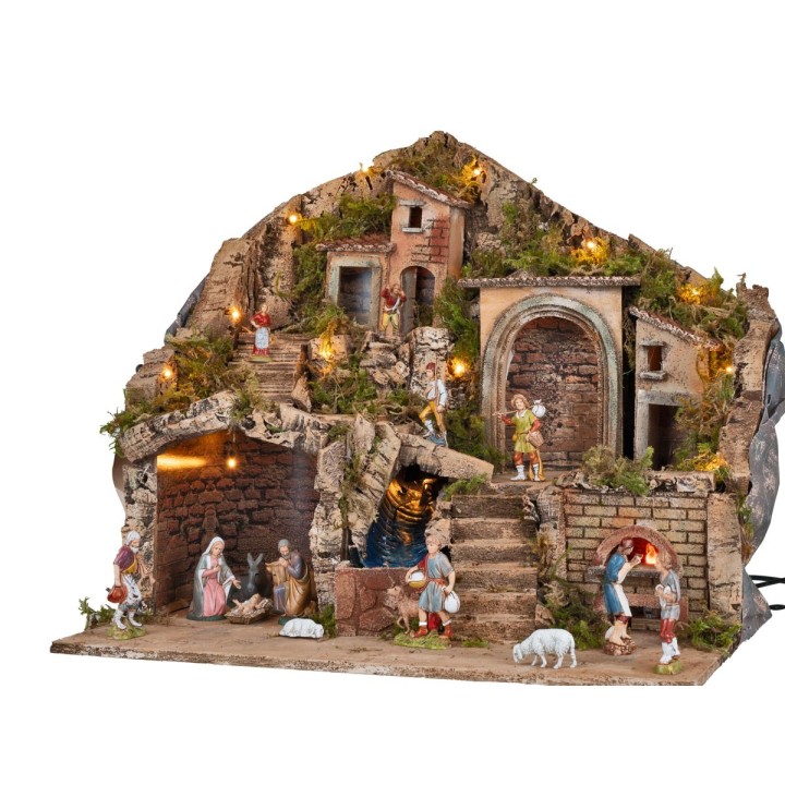 Illuminated nativity scene with an electric oven and waterfall