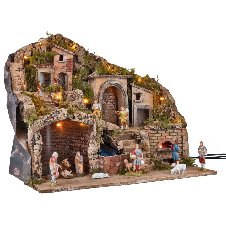 Illuminated nativity scene with an electric oven and waterfall