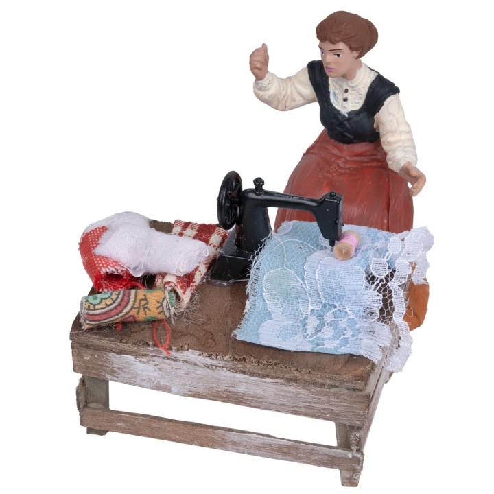 Seamstress table with machine and fabrics