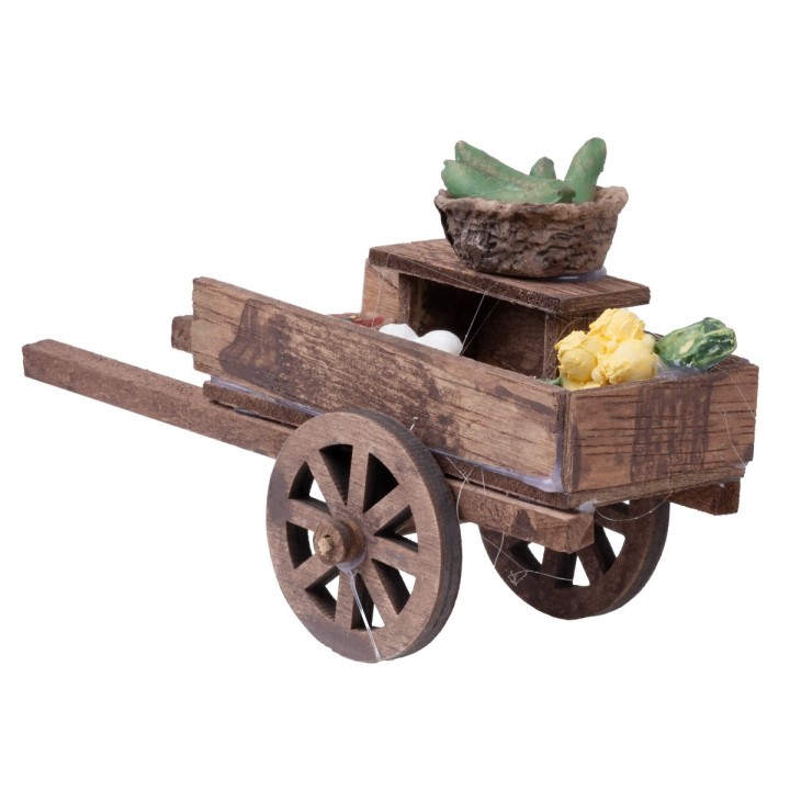 Carretto in legno con prodotti vari