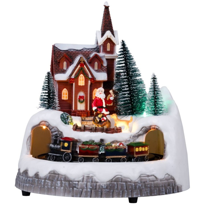 Village with moving train complete with lights and music