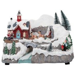 Pueblo de Navidad con trineo en movimiento completo de luces y