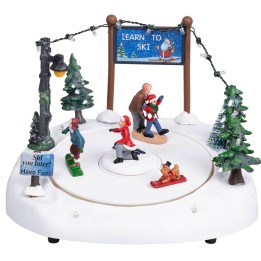 Ice rink with moving skiers complete with lights and music