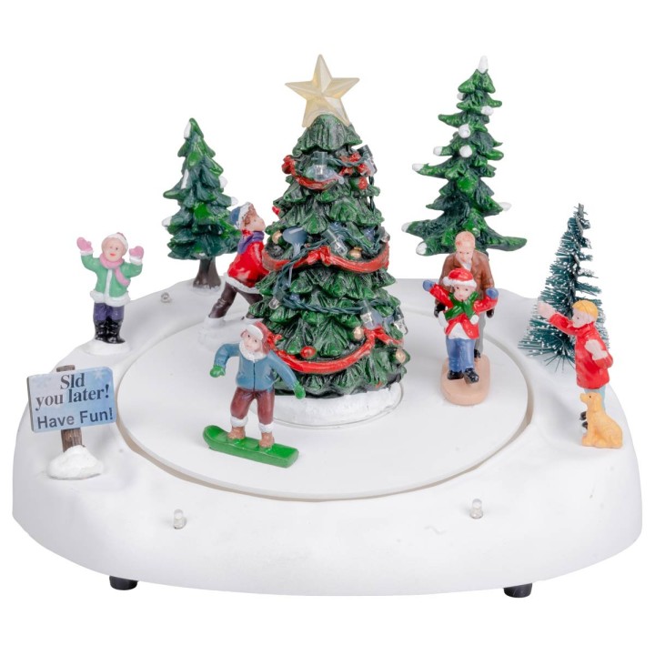 Ice skating rink with Christmas tree complete with light and