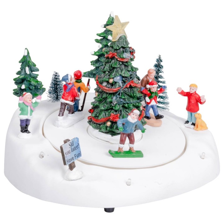 Ice skating rink with Christmas tree complete with light and