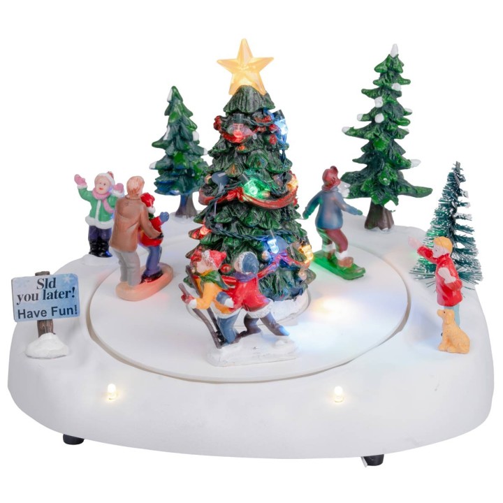 Pista di pattinaggio con albero di natale completa di luce e
