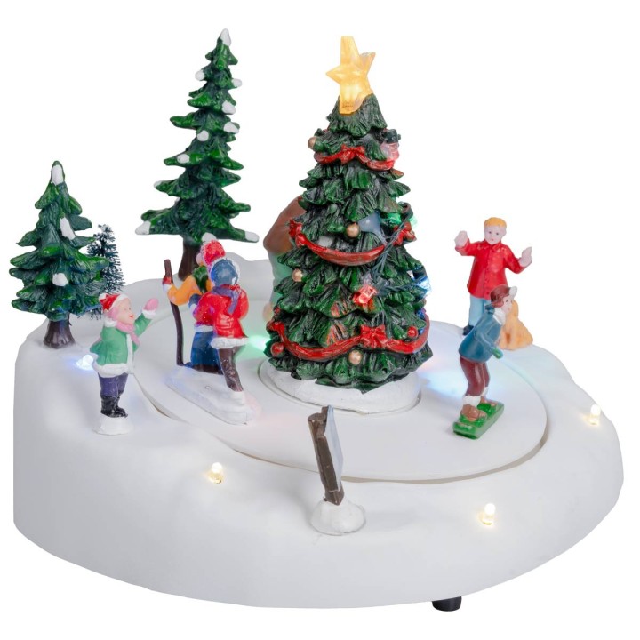 Pista di pattinaggio con albero di natale completa di luce e