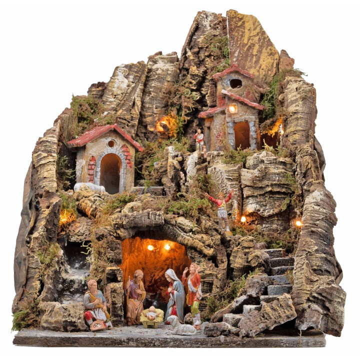 Illuminated nativity scene with a stream and long staircase