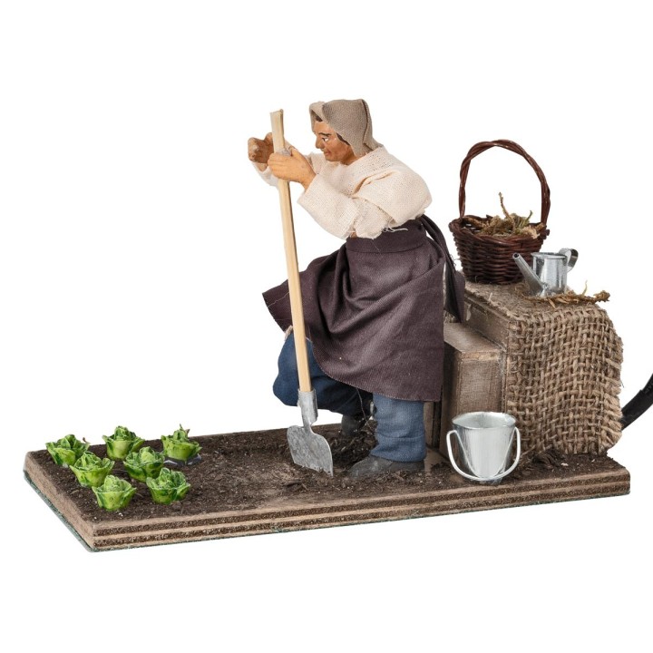 Hombre que cava serie 12 cm en movimiento