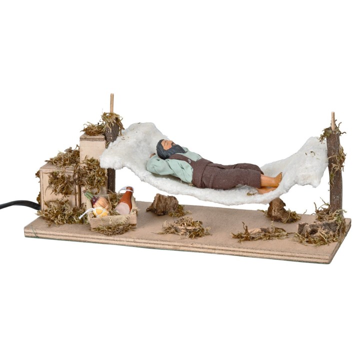 Hombre durmiendo en hamaca serie 12 cm en movimiento