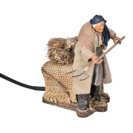 Agricoltore con rastrello serie 12 cm in movimento