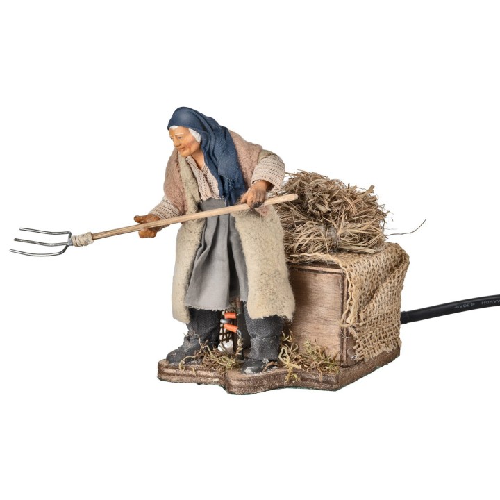 Agricultor con rastrillo serie 12 cm en movimiento
