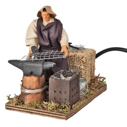 Blacksmith at work in motion 12 cm